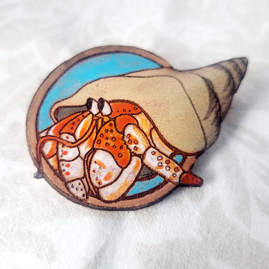 Hermit Crab on the Beach Leather Pin - July 2025 Limited Edition