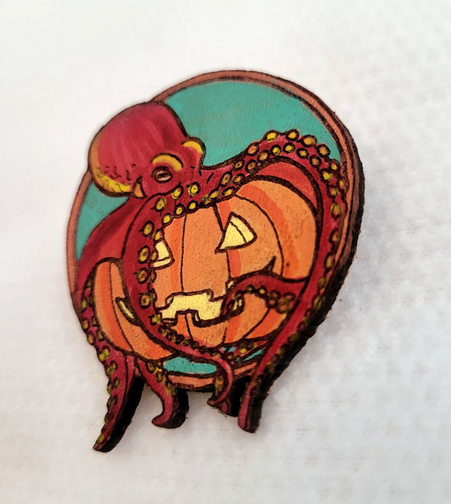 Octopus with a Pumpkin Leather Pin - October 2025 Limited Edition