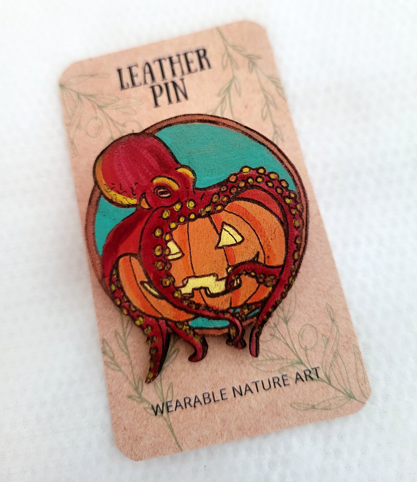 Octopus with a Pumpkin Leather Pin - October 2025 Limited Edition